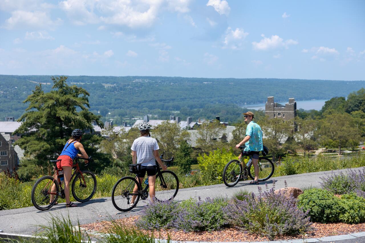 Bikers enjoy the vista from Libe Slope on a warm summer day.