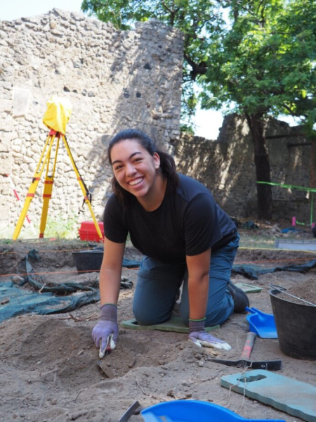 Grace works at the dig site in Italy.