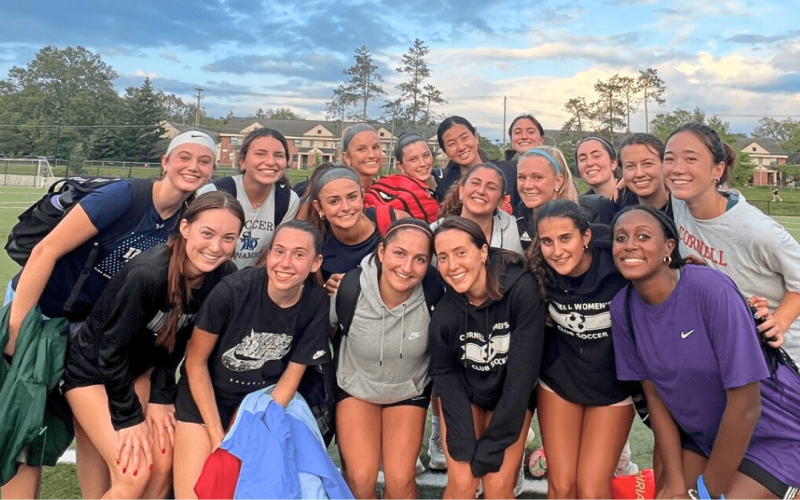 Riley's soccer club team poses together.