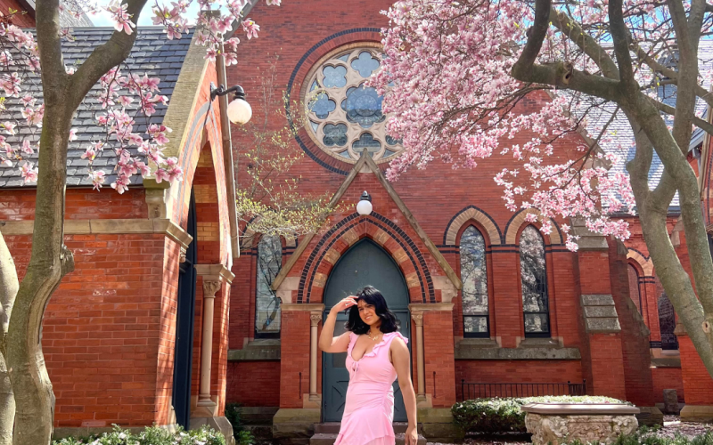 Sushmi poses in front of Sage Hall. 