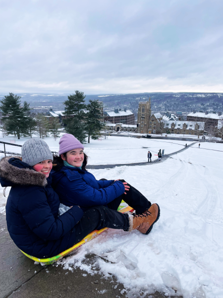 Haruna and a friend go sledding.