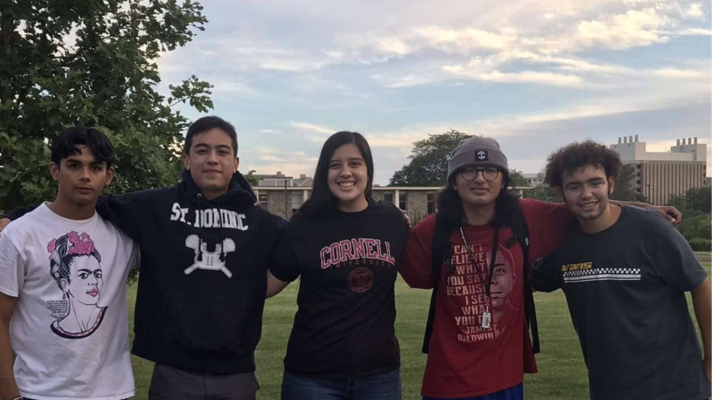 Friends pose together on the Ag Quad