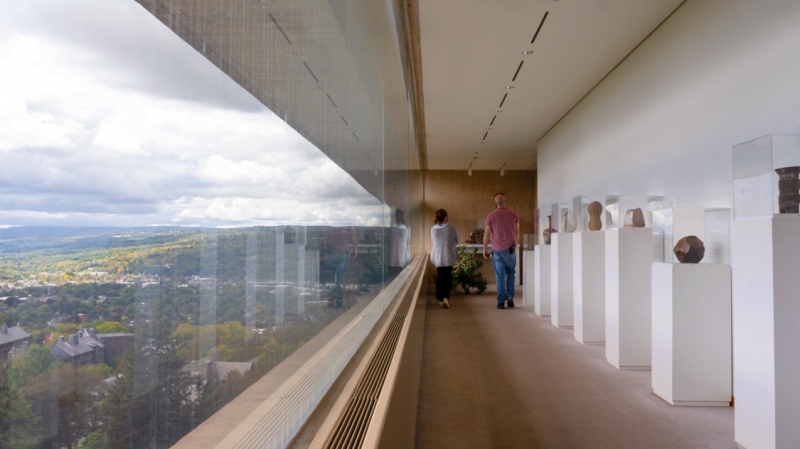 Visitors wander through the top floor of the Herbert F. Johnson Museum of Art.