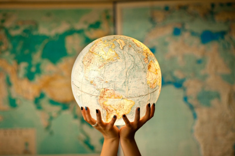 Stock images focusing on hands. Globe.