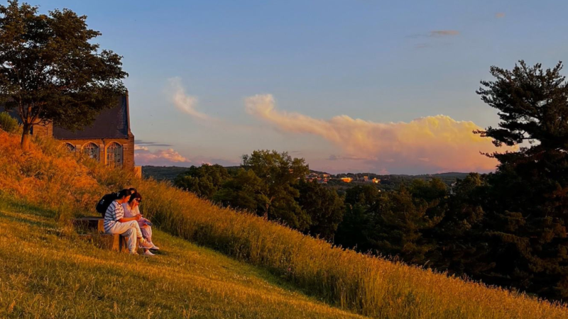 A group enjoys sunset on the slope.