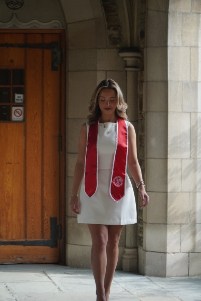 Cristina graduation photo on West Campus 