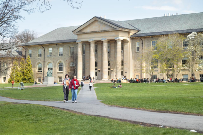 Students walk to class on the Arts Quad.