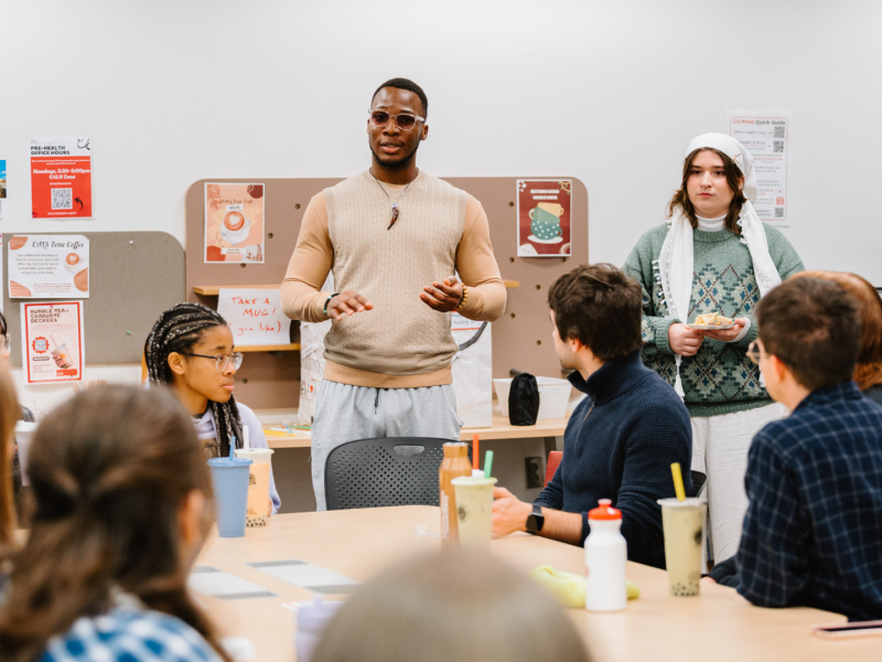 Kingsley presents to a group.