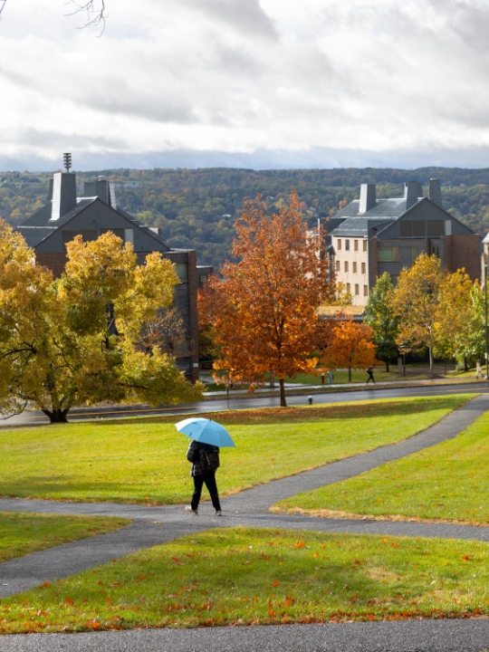 The sun shines on Libe Slope during a break in a rainy fall afternoon..