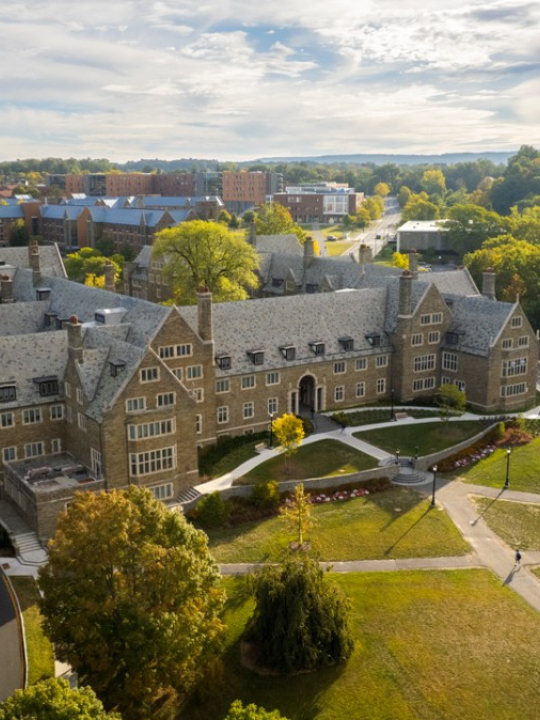 The sun rises over west campus.