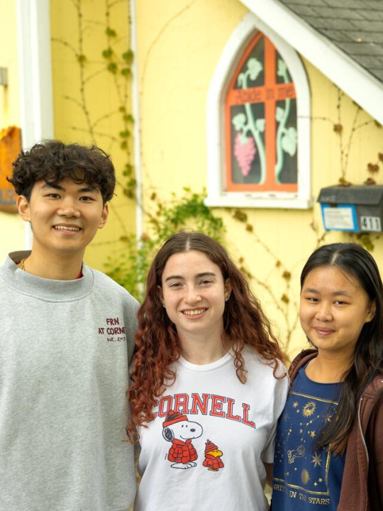 Alexander Lu, Jenna Rosenberg, and Arianna He deliver food to Peter De Mott Catholic Worker House.