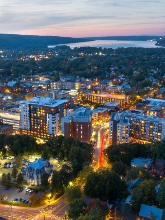 Downtown Ithaca is seen at sunset.